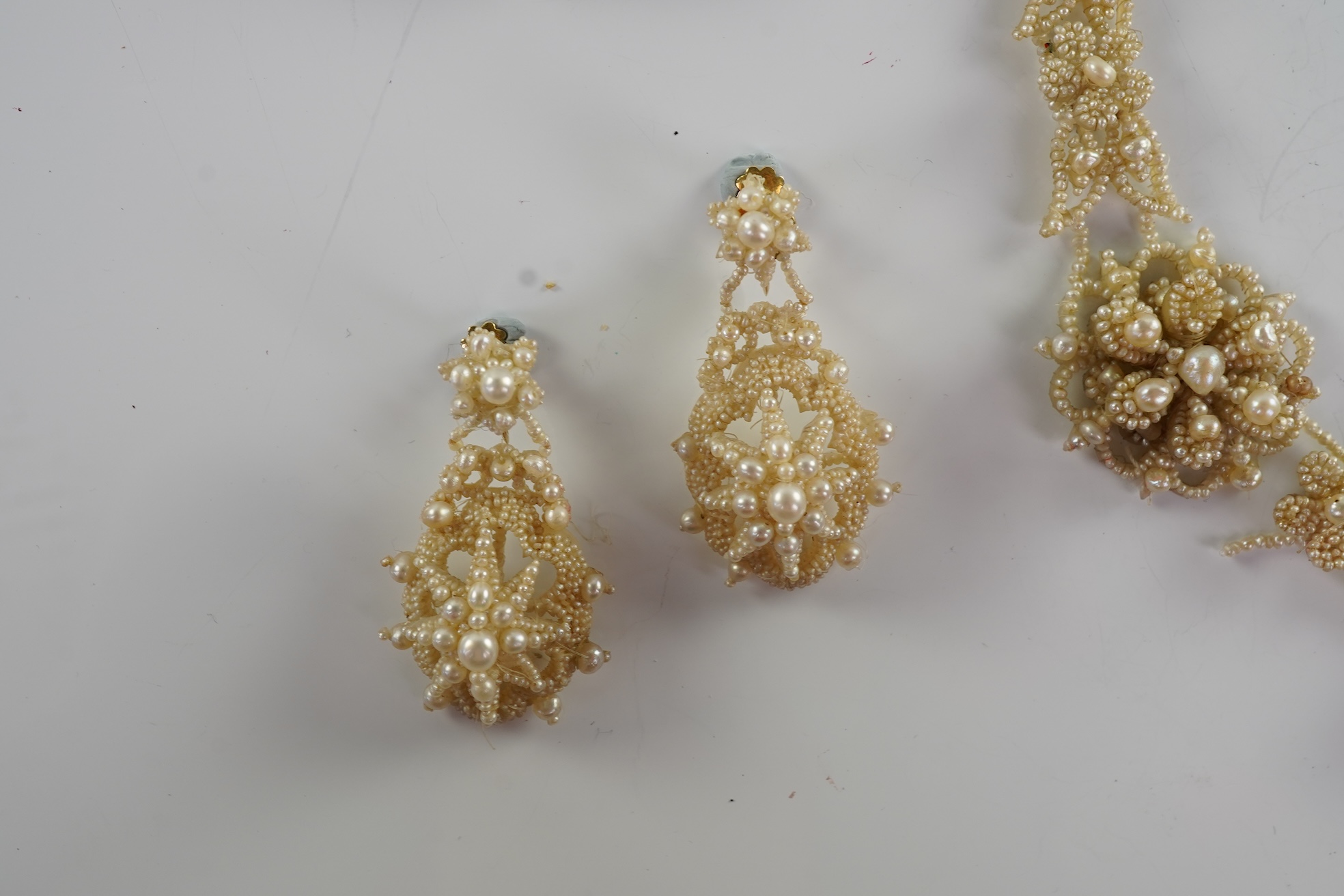 A Regency seed pearl necklace, brooch and pair of earrings, early 19th century